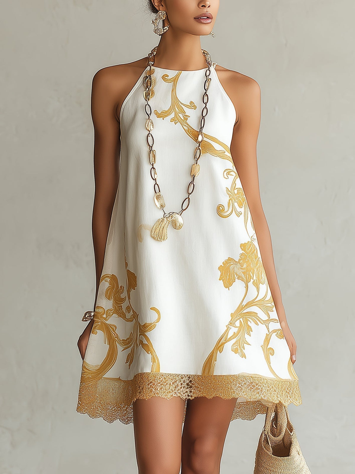 Lucía | Minivestido de encaje blanco con motivos dorados
