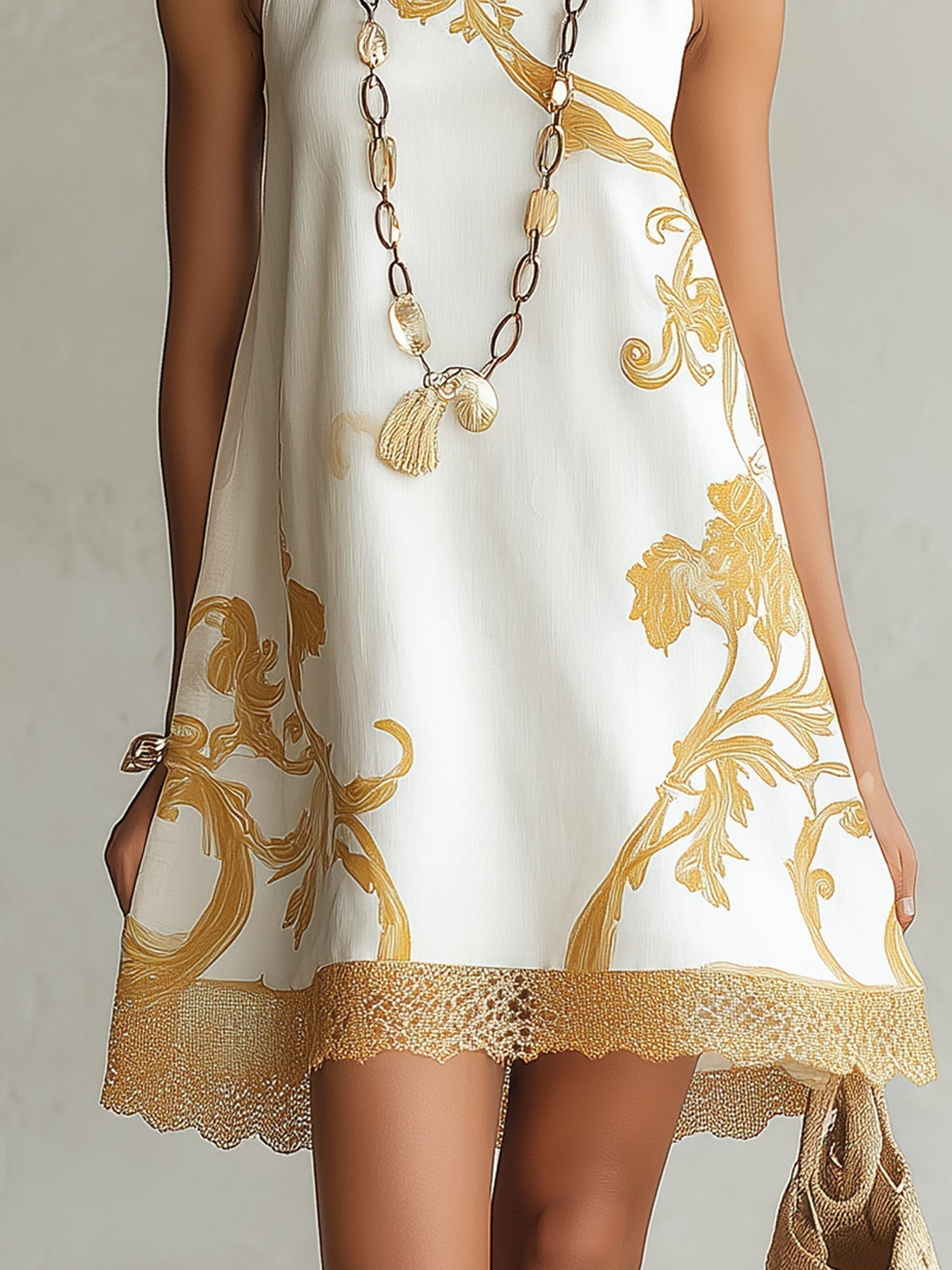 Lucía | Minivestido de encaje blanco con motivos dorados