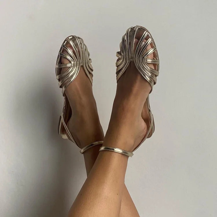 Sandalias planas doradas Vittoria