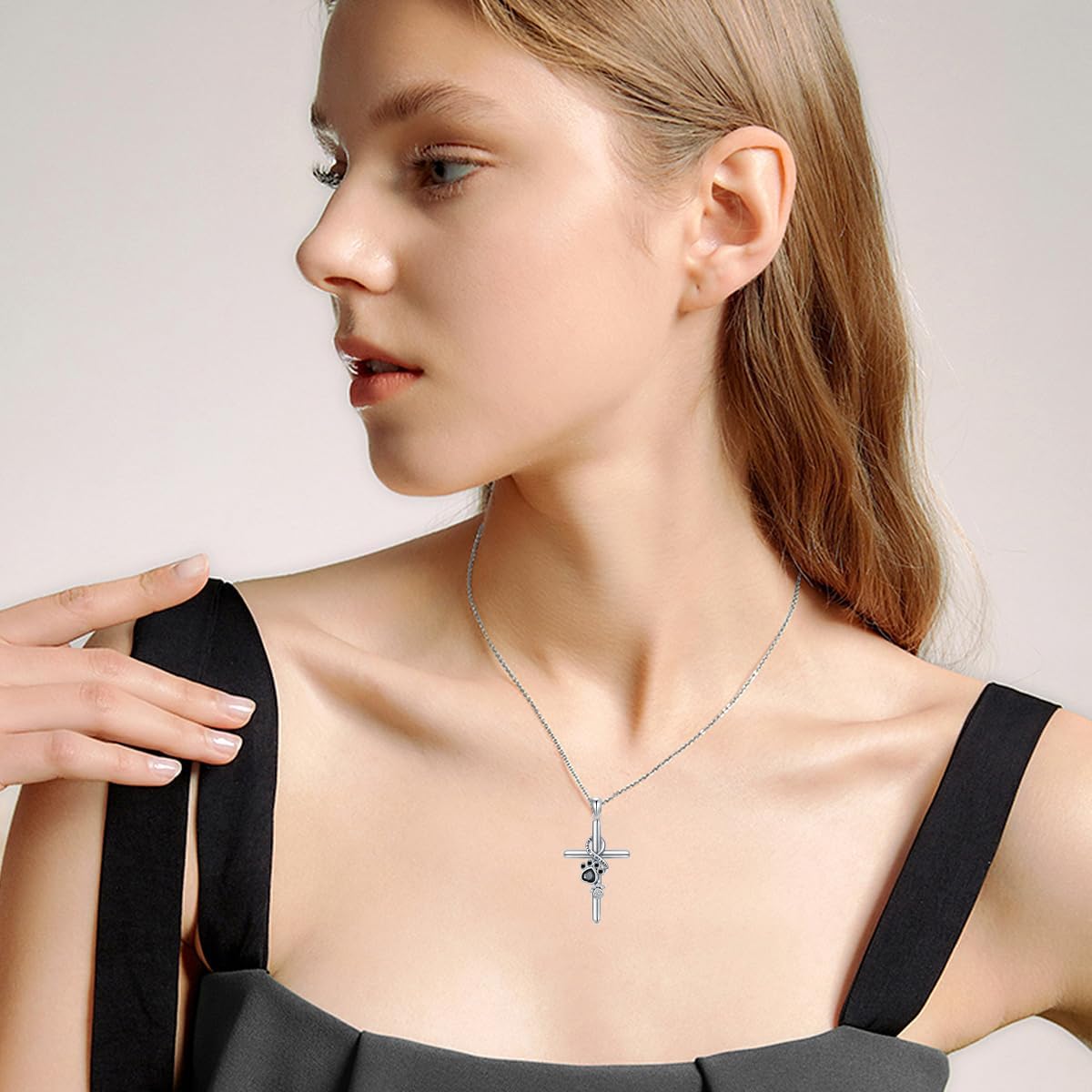 Collar de huella y cruz en plata de ley