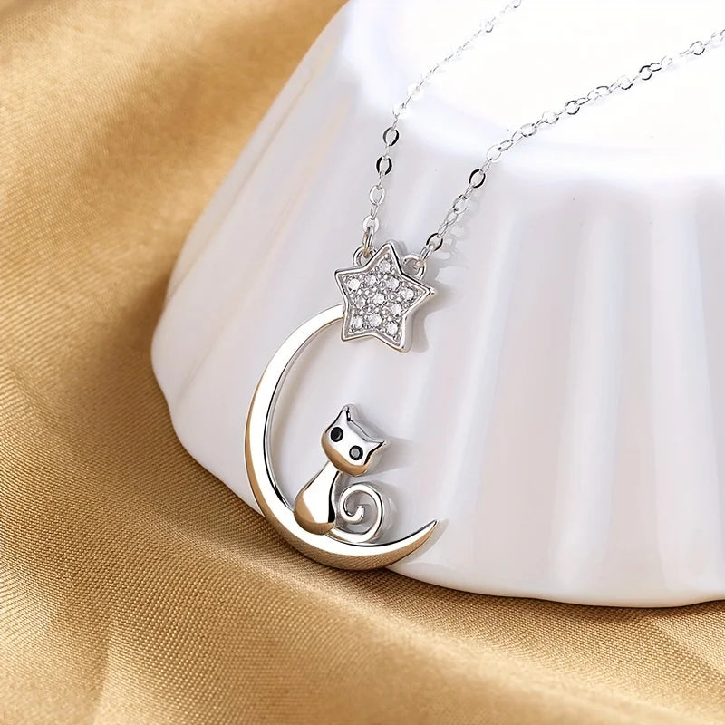 Collar de silueta de gato y estrellas en plata de ley