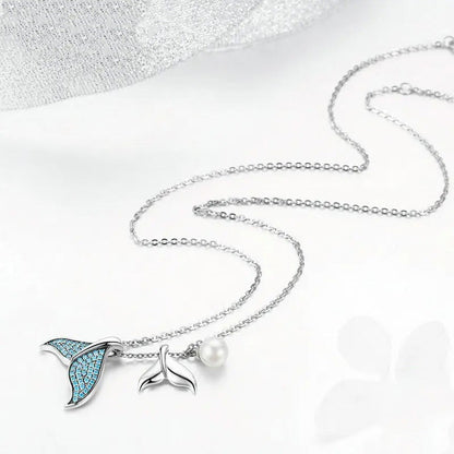 Collar océano con cola de ballena en perlas