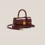 Bolso de mano brillante Mila