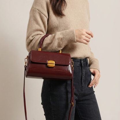 Bolso de mano brillante Mila