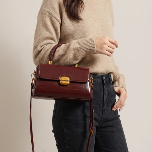 Bolso de mano brillante Mila