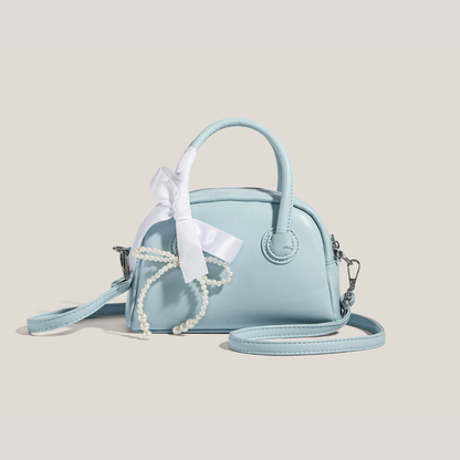 Bolso de mano metalizado Perla