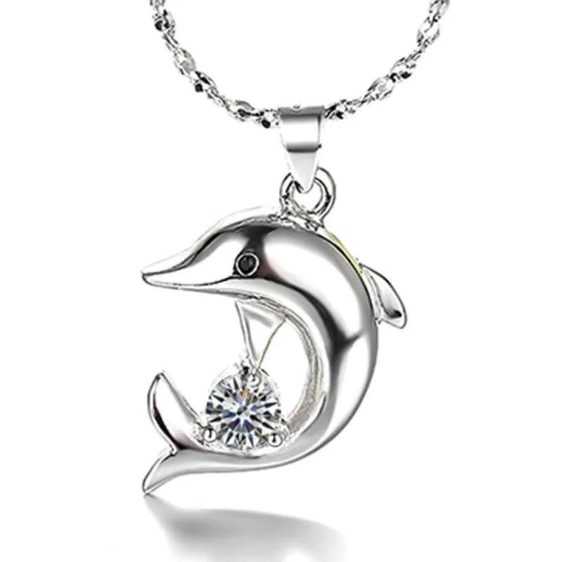 Conjunto de joyería de delfines en plata de ley