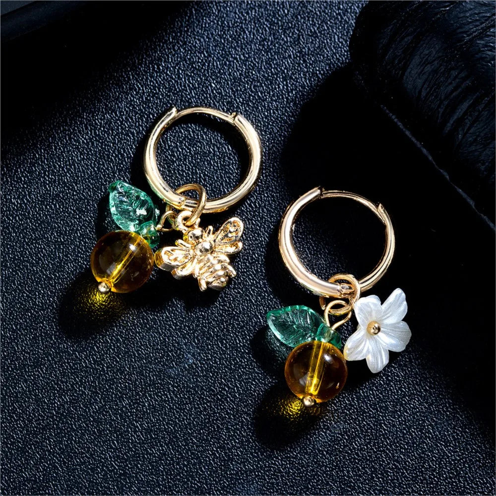 Pendientes de aro con flores y abejas