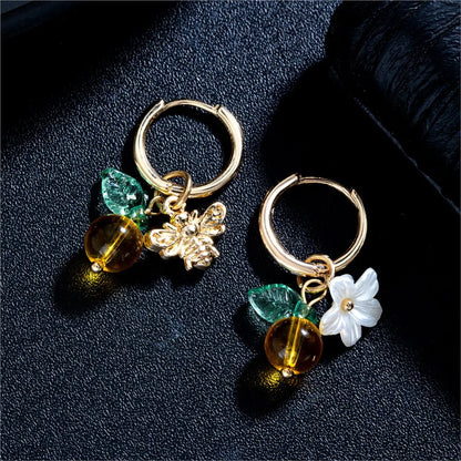 Pendientes de aro con flores y abejas