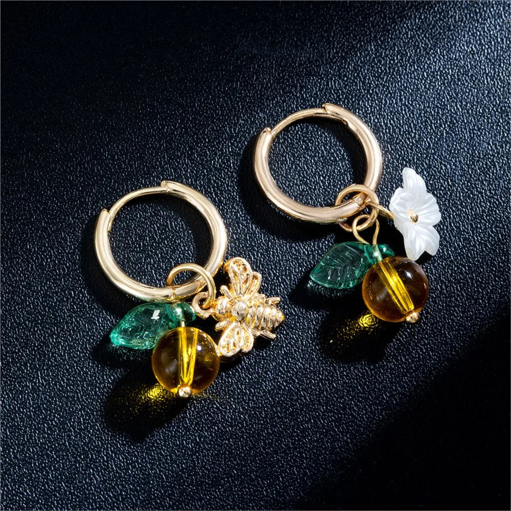 Pendientes de aro con flores y abejas