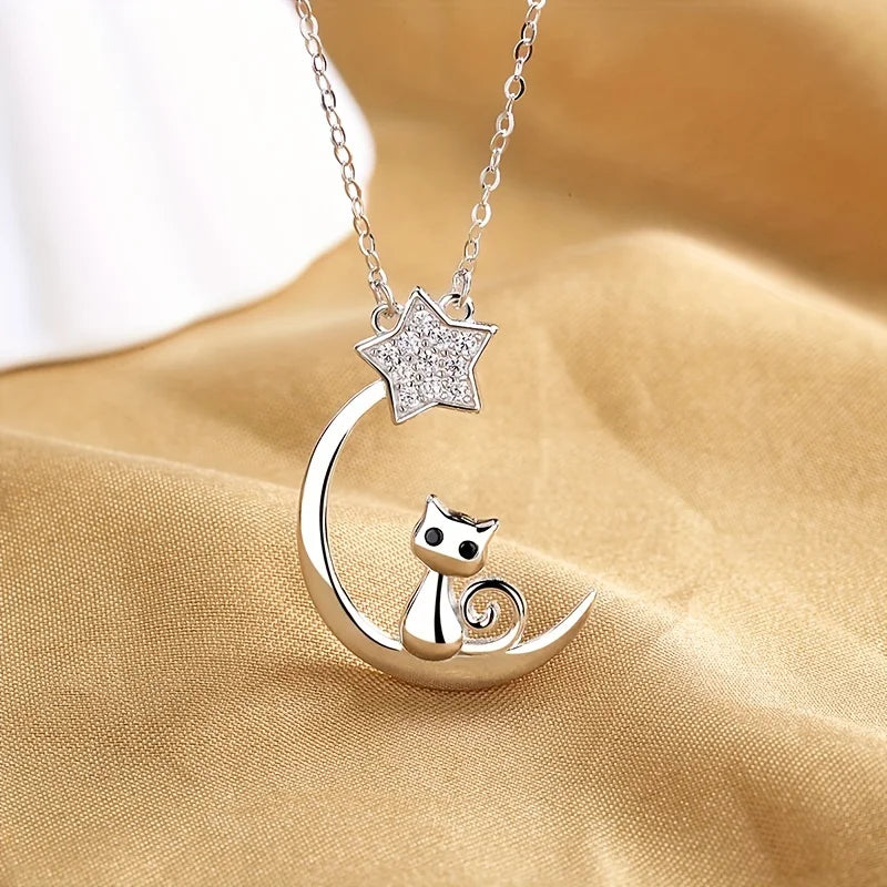 Collar de silueta de gato y estrellas en plata de ley