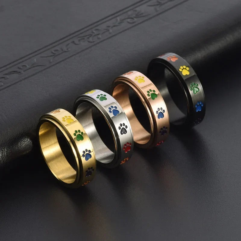 Anillo antiestrés giratorio con huellas