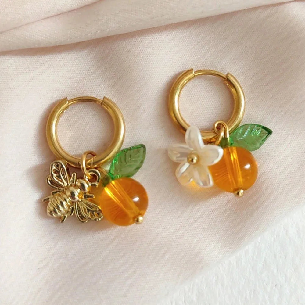 Pendientes de aro con flores y abejas