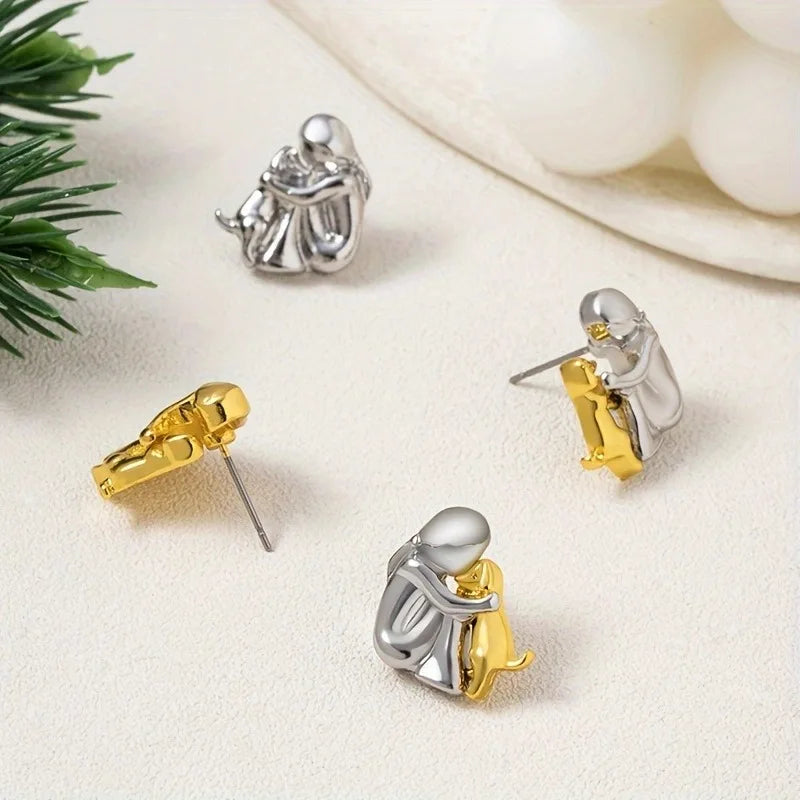 Pendientes huggie bicolor plata y oro
