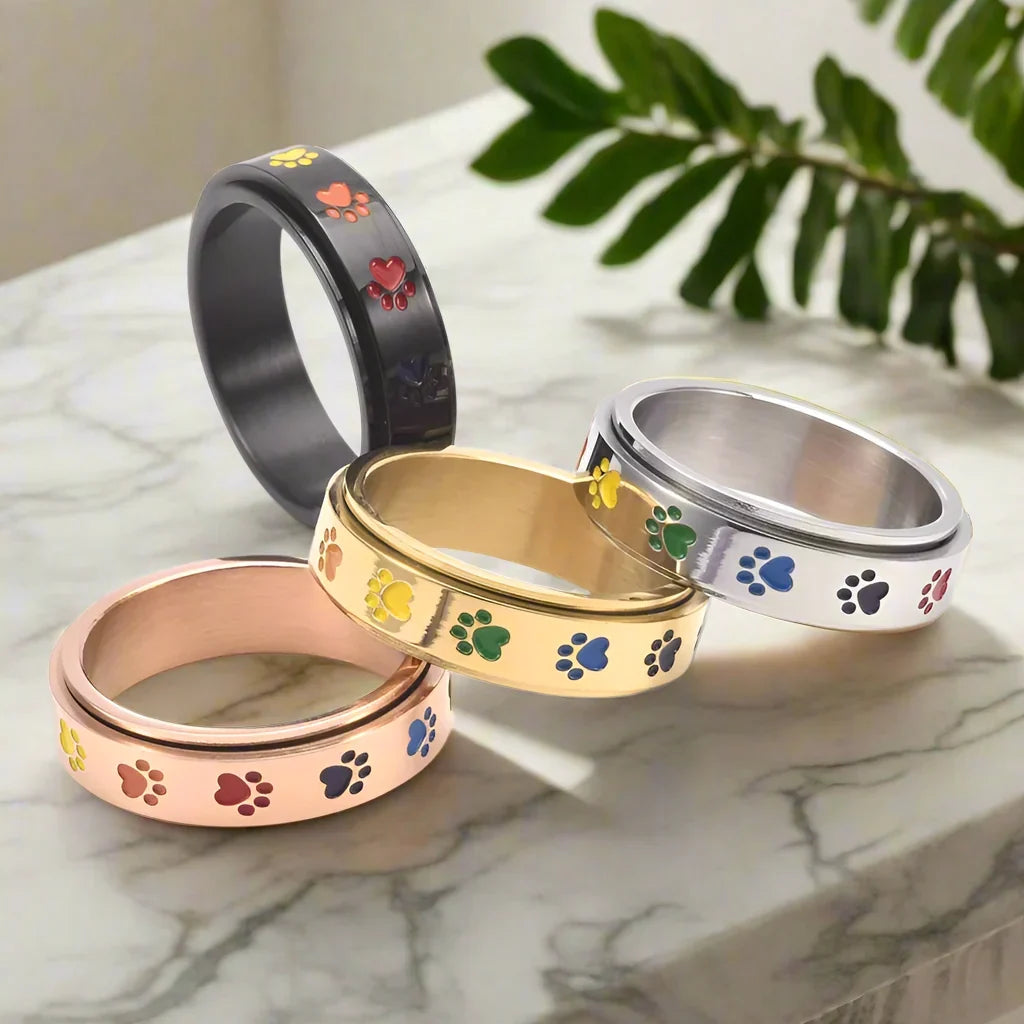 Anillo antiestrés giratorio con huellas