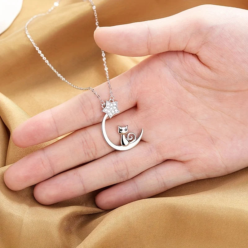 Collar de silueta de gato y estrellas en plata de ley