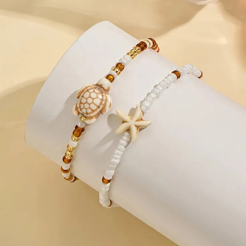 Conjunto de tobilleras estrella de mar y tortuga