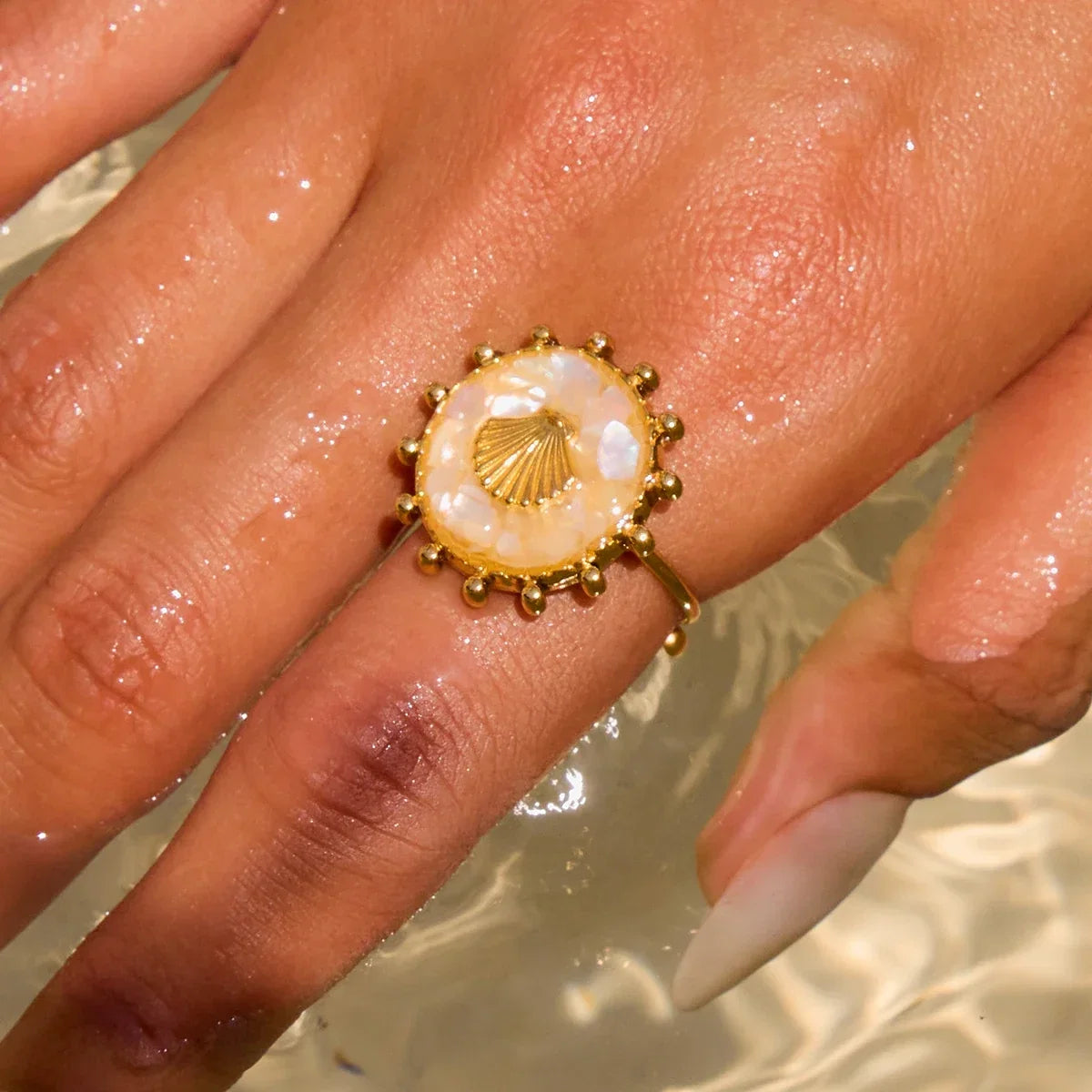 Anillo de concha y estrella de mar
