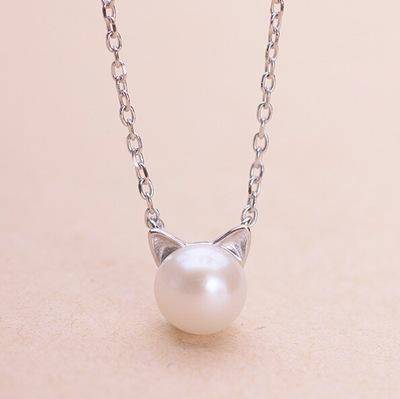 Collar de perla con gato — conjunto