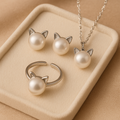 Collar de perla con gato — conjunto